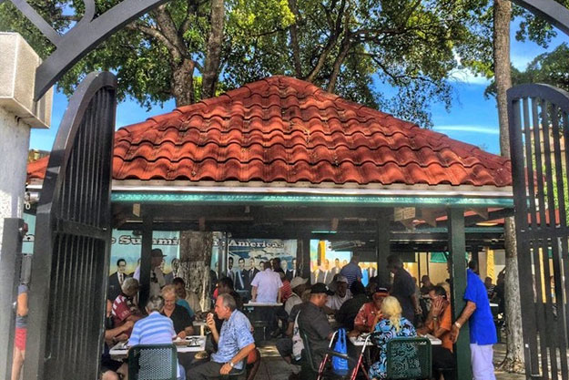 The sounds of dominoes shuffling fill the air in Miami’s Domino Park in the Little Havana Neighborhood